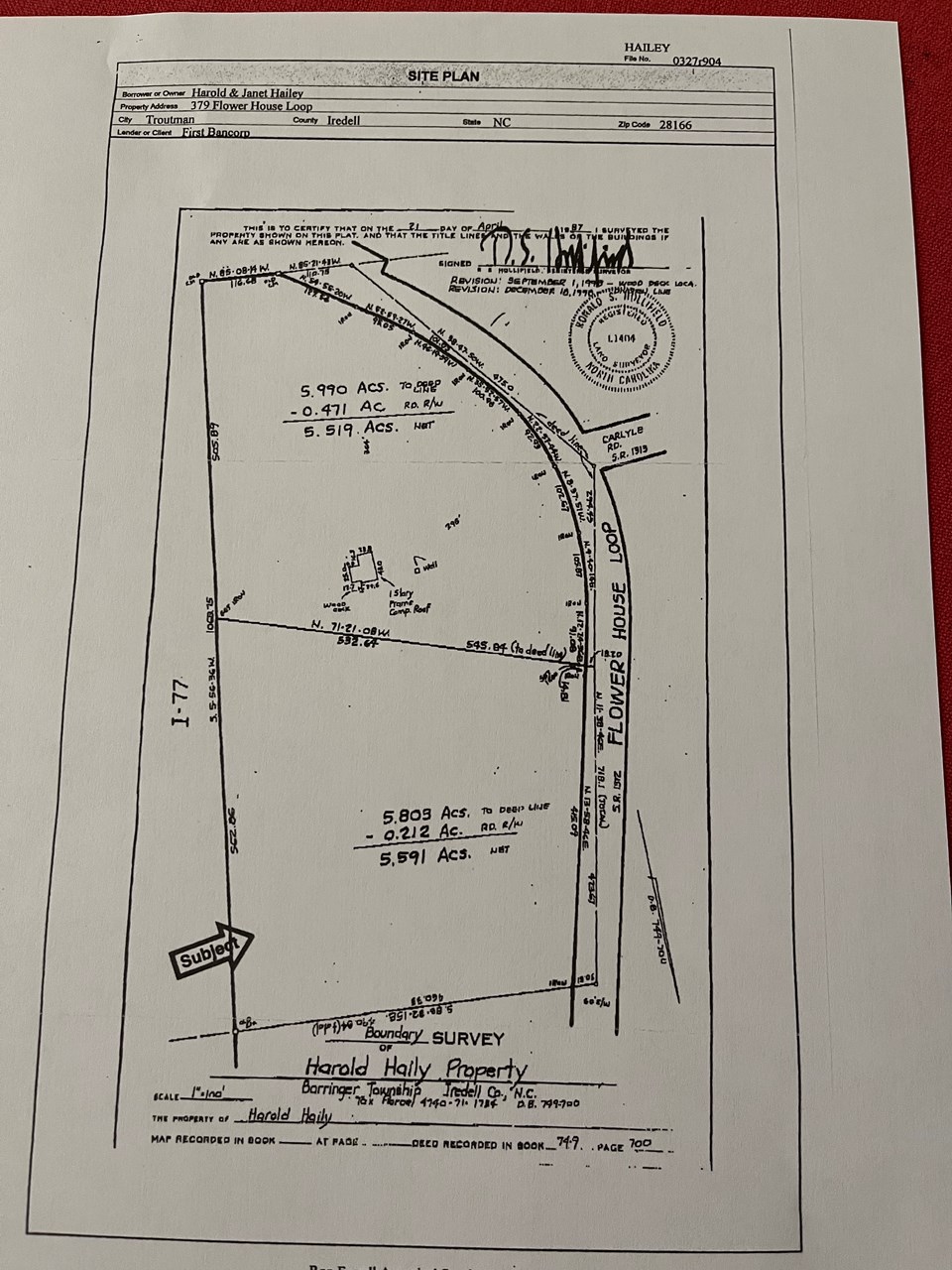 survey of property - 1300 feet on road frontage and over 1000 feet of exposure on i77 large level parcel of land adjacent to other businesses. land includes 2 homes, multiple buildings, large workshop. property is fenced in with electronic gate access. a great investment property.