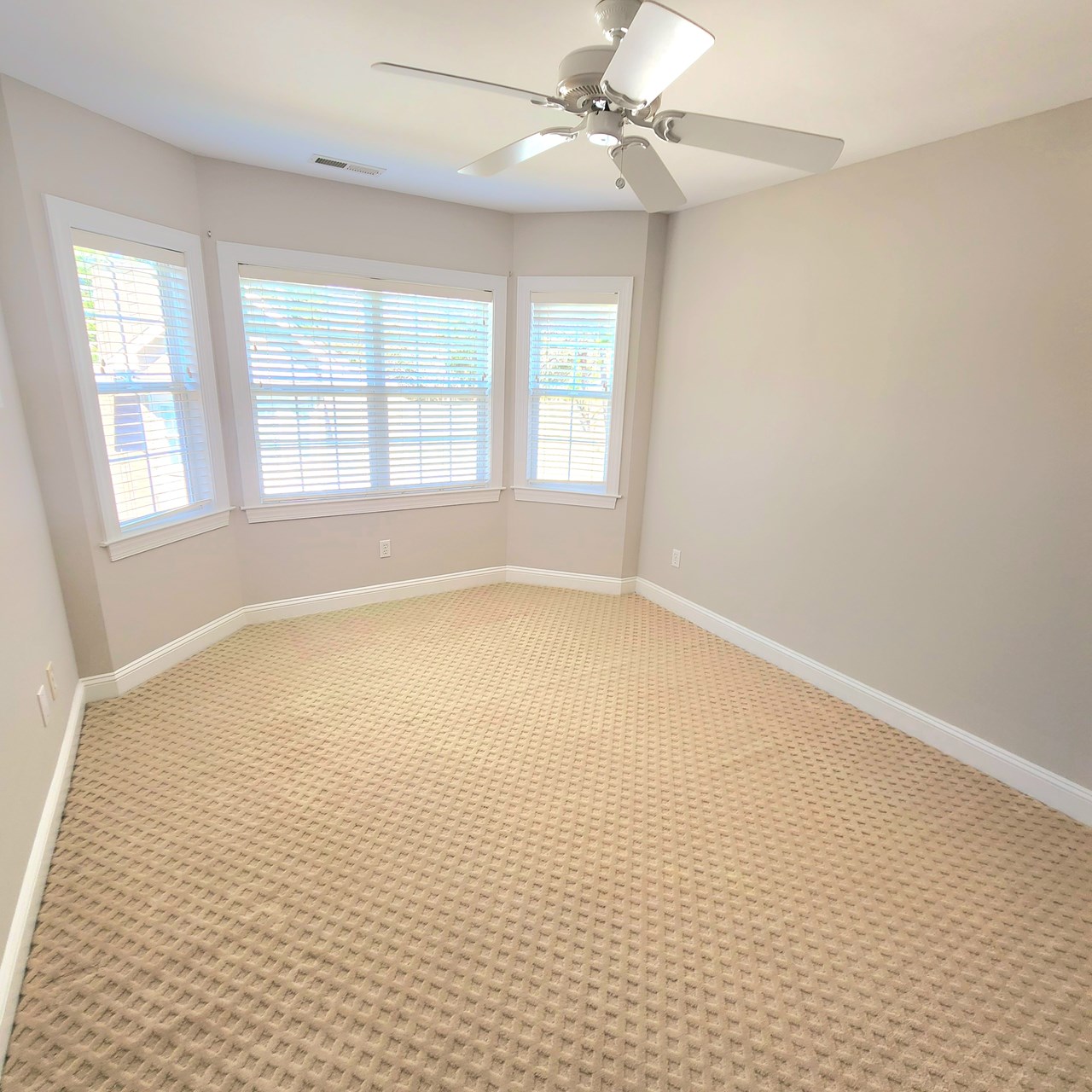 upstairs bedroom 2 with large bay window