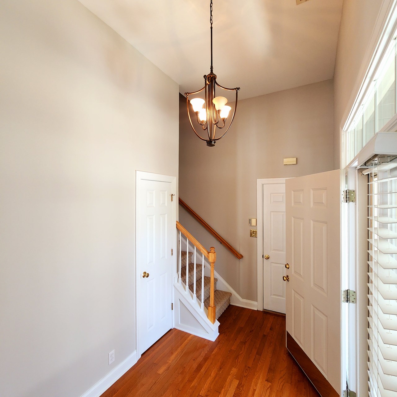 spacious foyer with coat closet