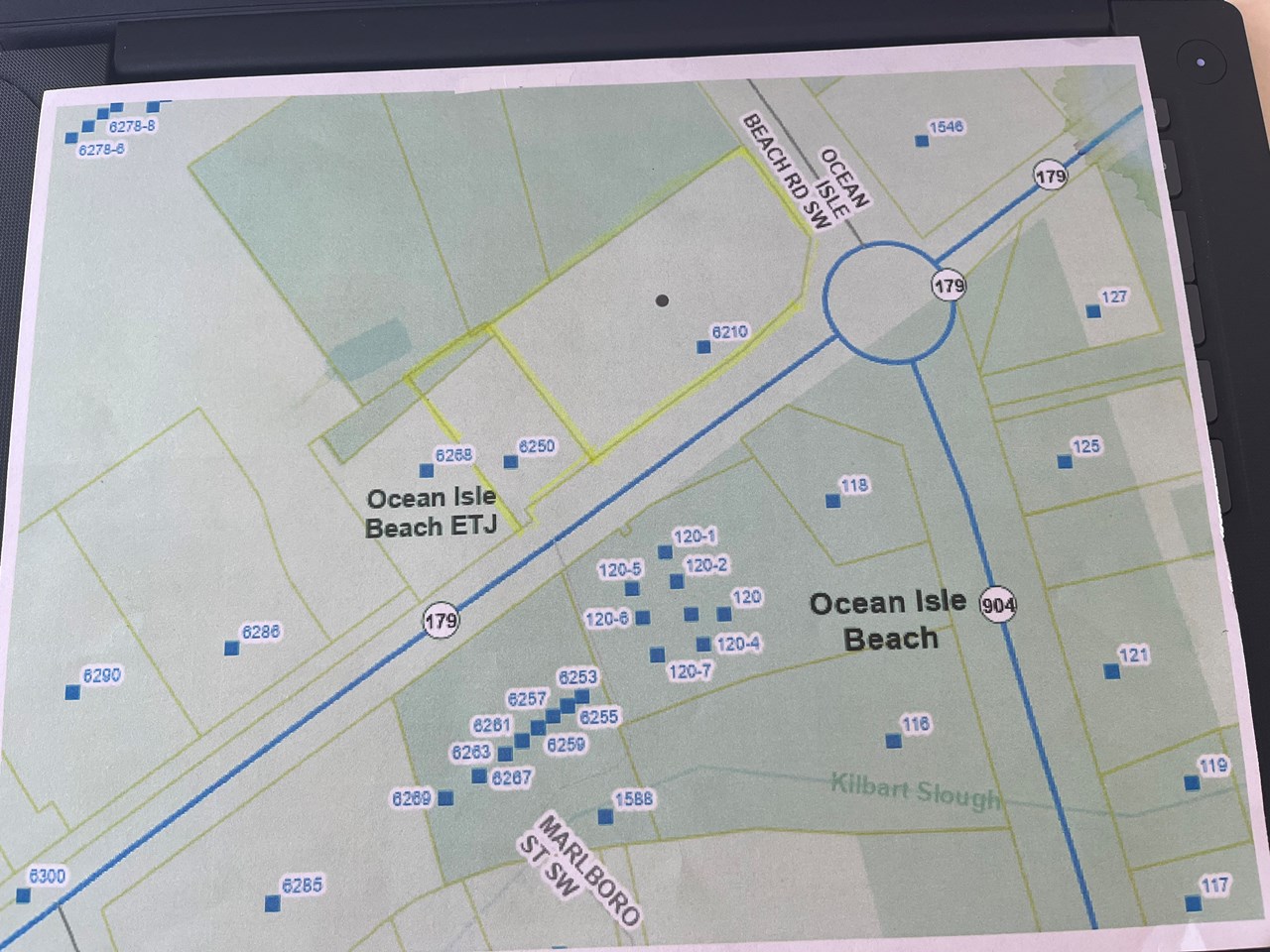 commercial land lease at roundabout in ocean isle beach nc this is a commercial land lease, lease price showing is price for a years lease with price and terms negotiable. includes 2 separate parcels, parcel 24300018 -1.39 acres and parcel 24300027- .39 acres, a total of 1.78 acres total of commercial land. the property is located at the roundabout just before crossing bridge to the island of ocean isle beach. there are many shopping centers that surround the roundabout. a shopping center with a lowes food, service station, jersey mikes, domino pizza, coffee house, nail salon, urgent care, dollar general, car wash and abc store are all located next to this property on this side of road. the opposite side of road is odell williamson municipal airport, a third shopping center opposite of roundabout includes a publix grocery store, several shops, tire service, and a new mcdonalds, the final point of the roundabout includes a service station, pizza and ice cream restuarant, and other shops.