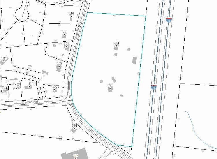 view of property from interstate 77 of over 1000 feet of exposure - 11.1 acres plus buildings and 2 homes. property is located at exit 42 and i77 on flower house loop which runs alongside of i77.  great investment property.  owners currently operate a print shop on a portion of the property. 
 lumber company directly across the street from property.  and a number of new businesses adjacent to this property, call listing agent, vickie kidd at 704-634-9885 for a tour of the property.  you will not be disappointed.